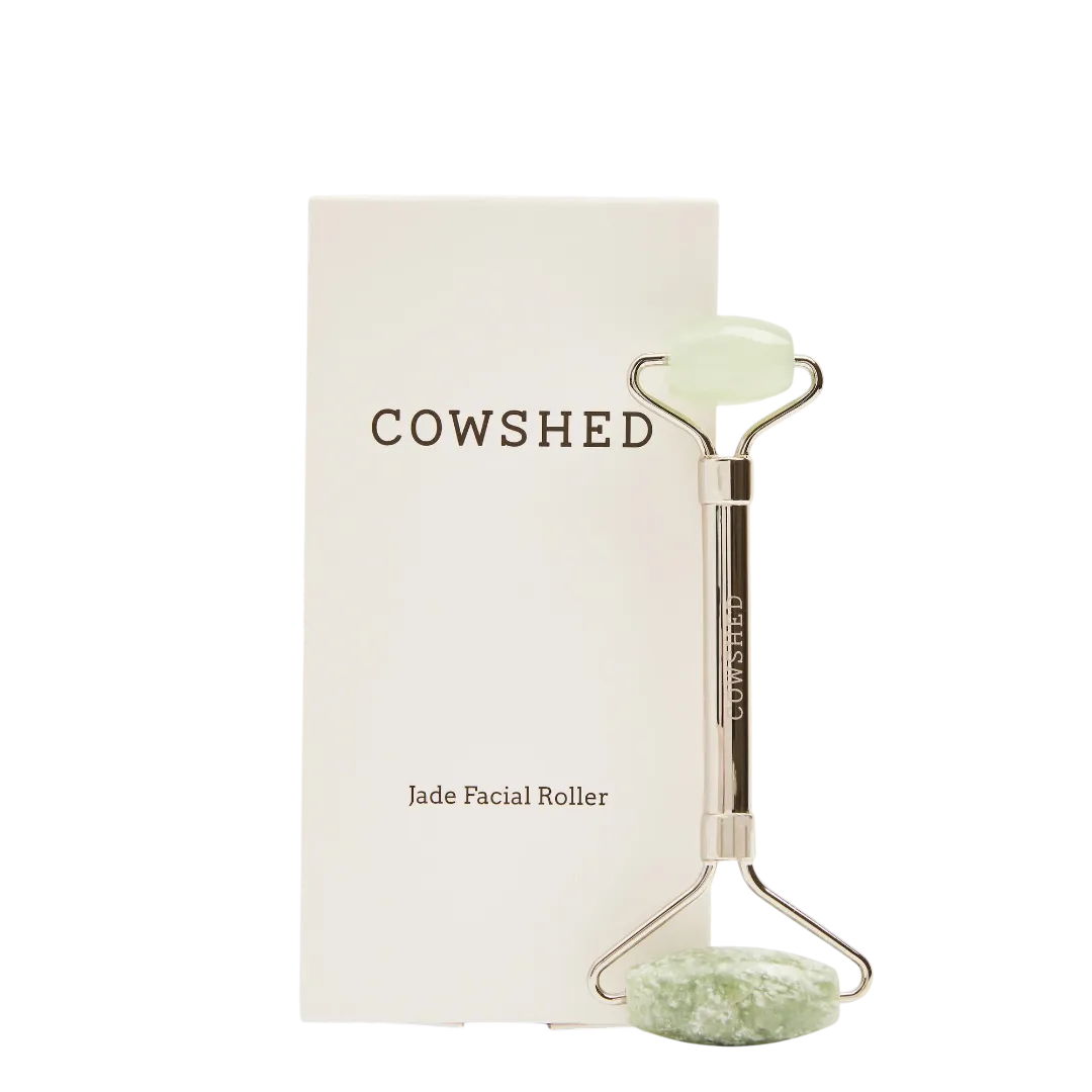 Cowshed jade facial roller with packaging on a white background
