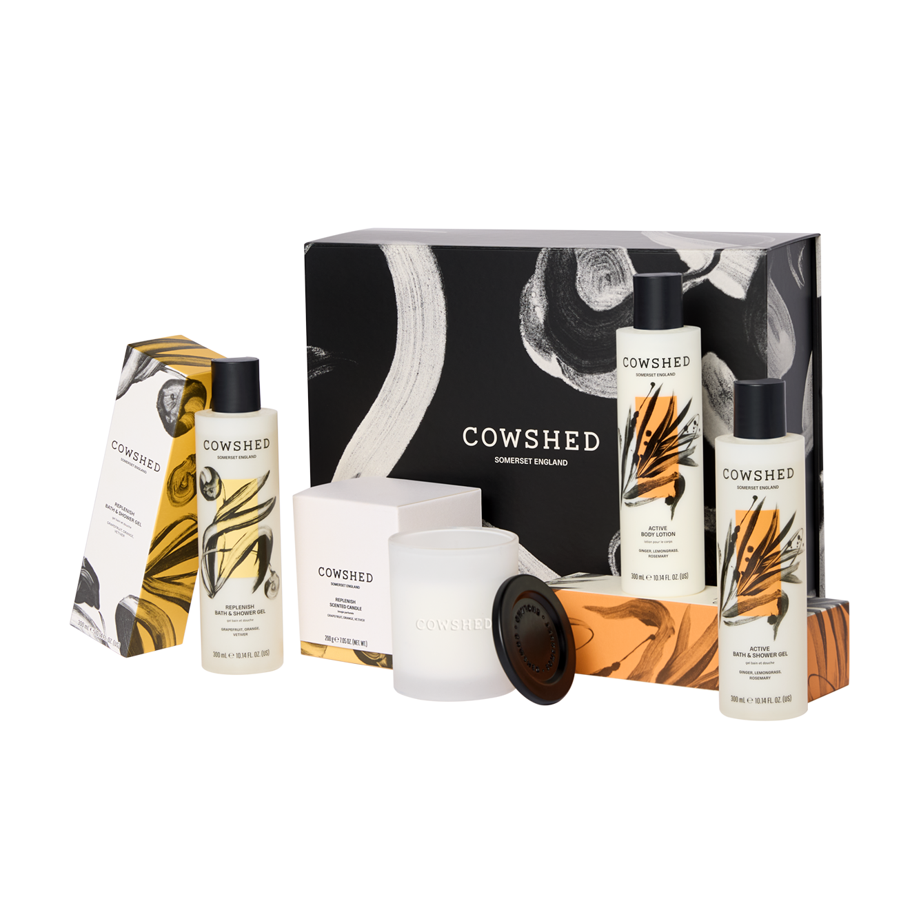Cowshed product set including bottles, boxes, and a candle on a white background
