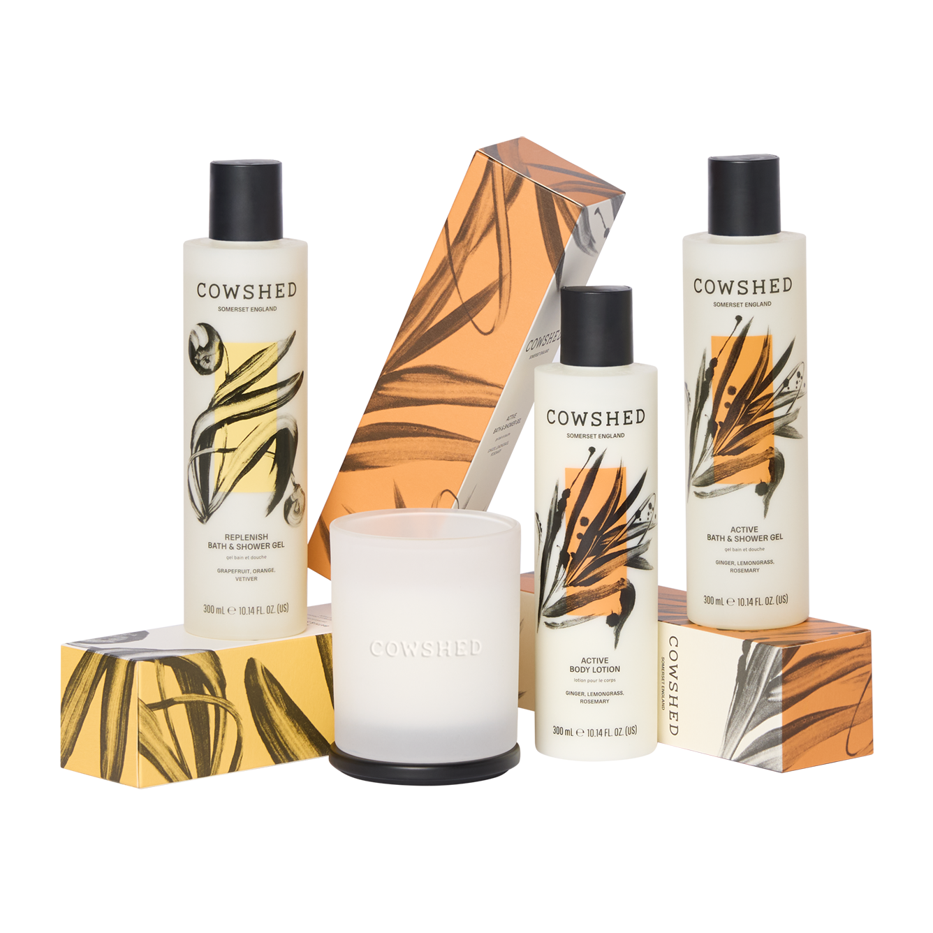 Cowshed skincare products including bottles and a candle on a white background