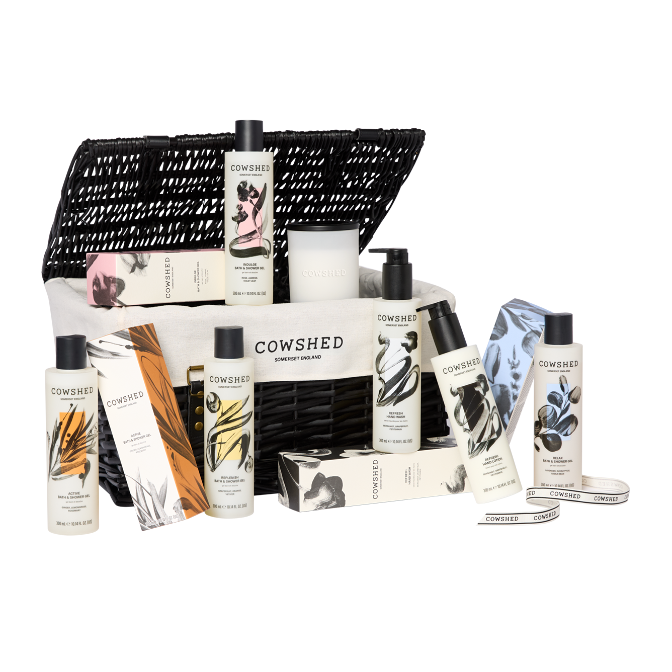 Cowshed product set including bottles, a bag, and other items on a white background