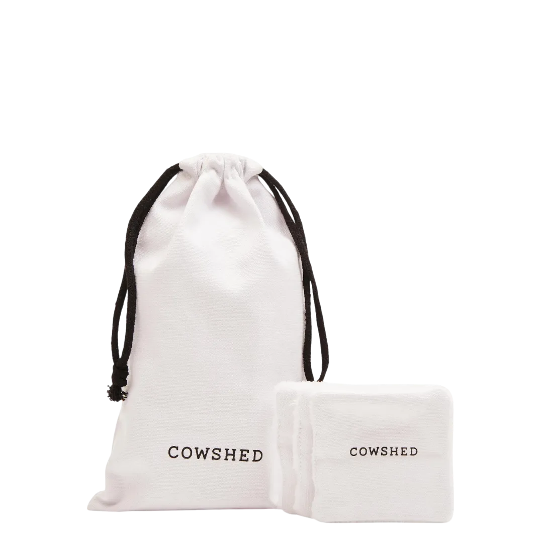 Cowshed branded drawstring bag and pouch on a white background
